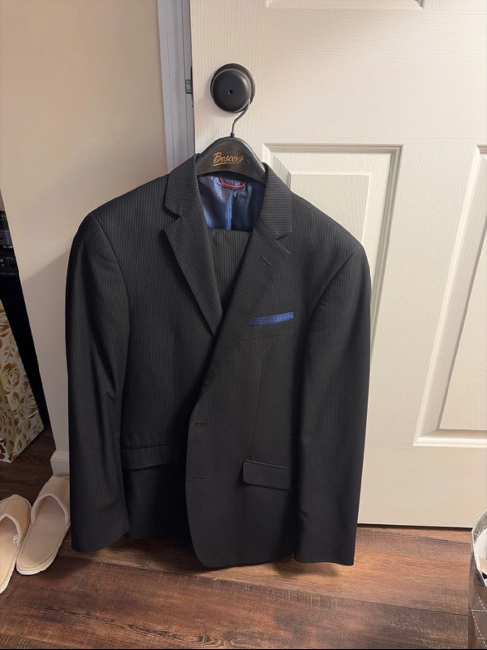 Classic Men's Black Pinstripe Suit Jacket with Blue Pocket Accent